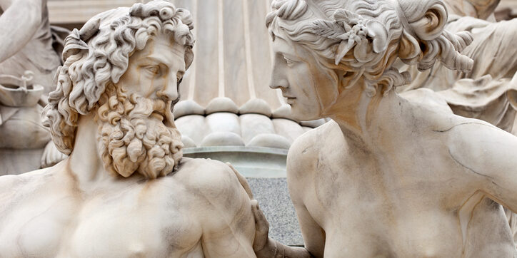 Man And Woman Conversing The Atena Statue In Vienna, Austria